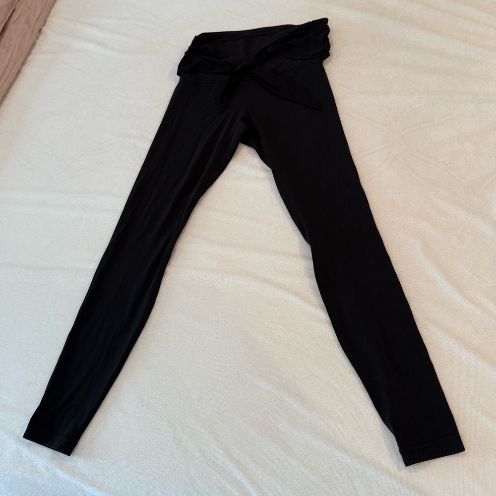 Lulu Lemon Black Leggings with a tie on stomach area